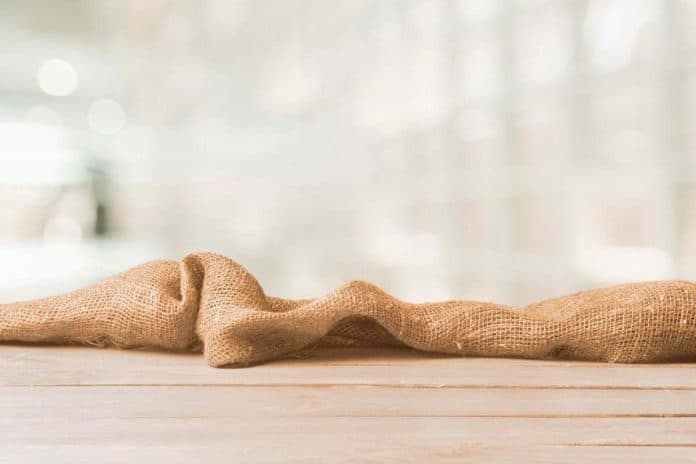 A burlap grow map on a wooden table