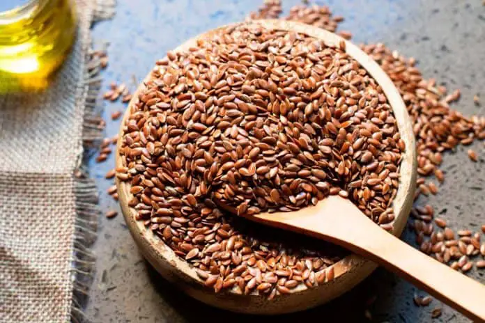 Flax seeds in a wooden bowl